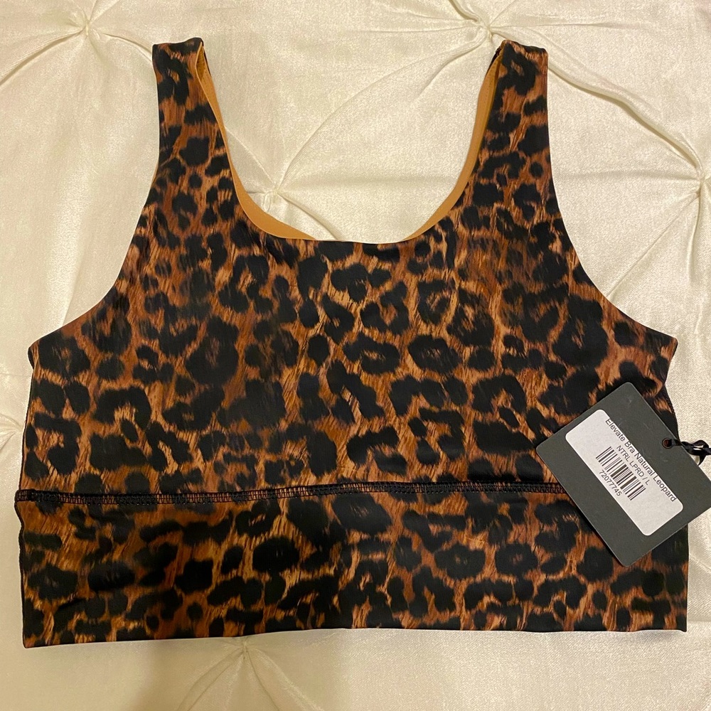 BRAND NEW WITH TAGS—DYI Elevate Bra in Natural Leopard. Size Large.